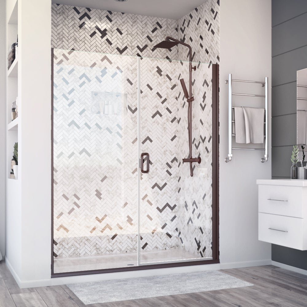Holcam Distinctive Elite semi-frameless glass panel and swing shower door